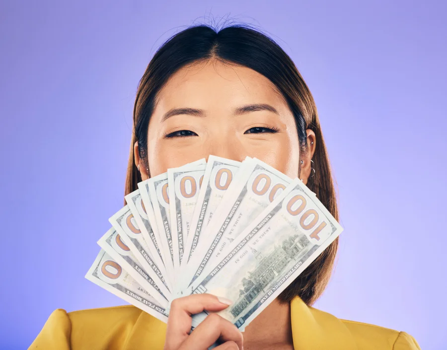 Homeowner reviewing biweekly mortgage payment schedule at kitchen table