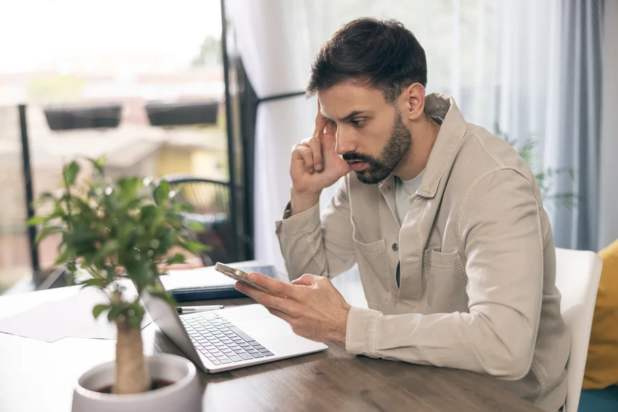 Person reviewing mortgage documents after job loss in Florida