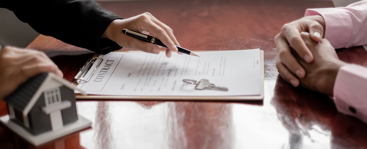 Florida homebuyer reviewing mortgage approval documents between conditional approval and clear to close