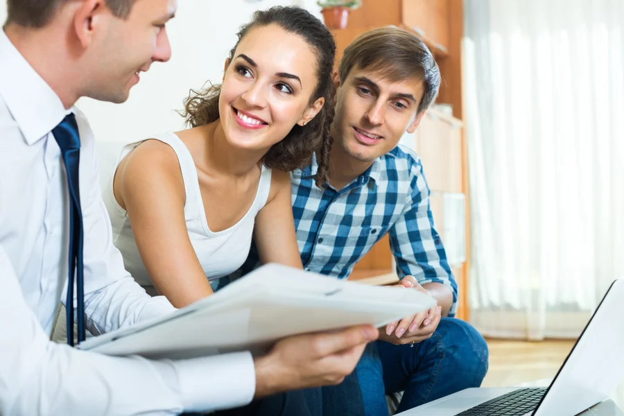 Homebuyer reviewing conventional loan requirements with a mortgage broker in Tampa