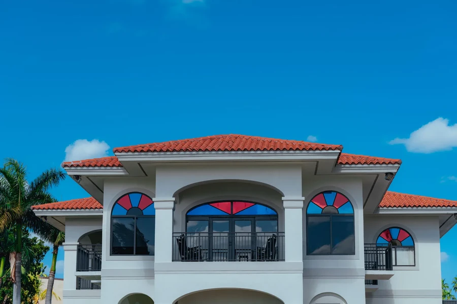 Two story white single family home with a traditional exterior, the kind of Florida property reviewed under FHA appraisal standards