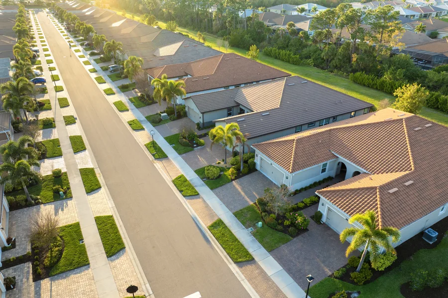 Florida neighborhood decorated for Fourth of July with homes and palm trees