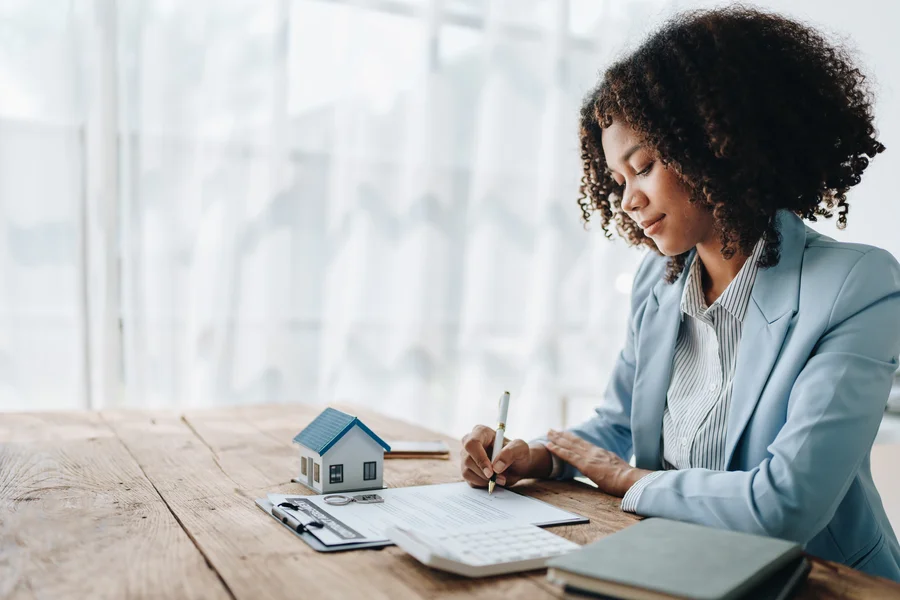 Couple separated reviewing mortgage documents after divorce in Florida