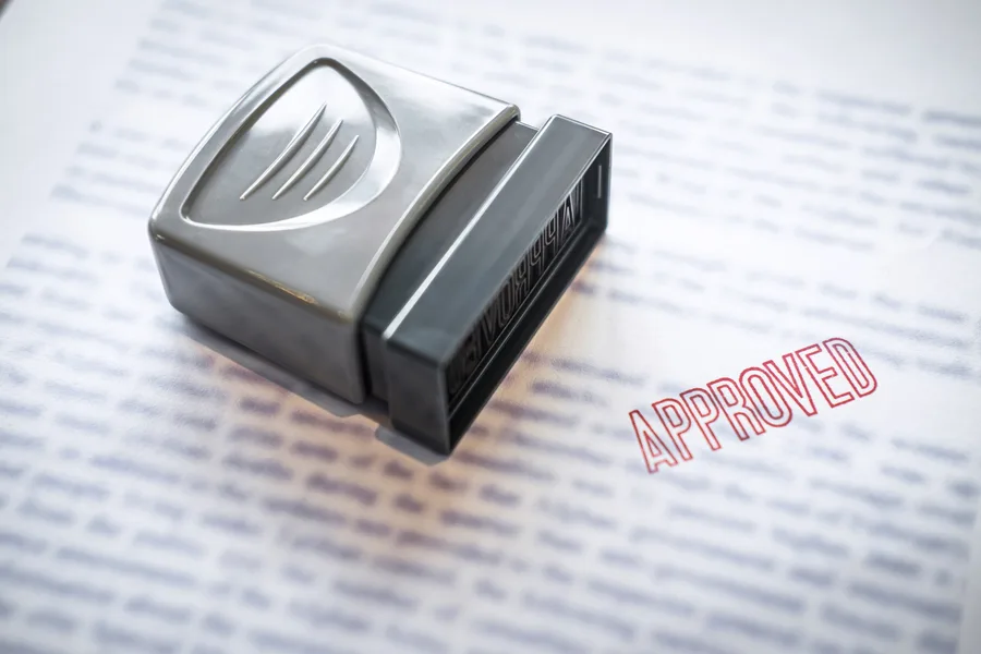 Self-employed borrower reviewing bank statements for a low-doc mortgage in Florida
