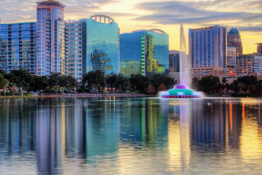 Downtown Orlando skyline across Lake Eola with the fountain in the foreground