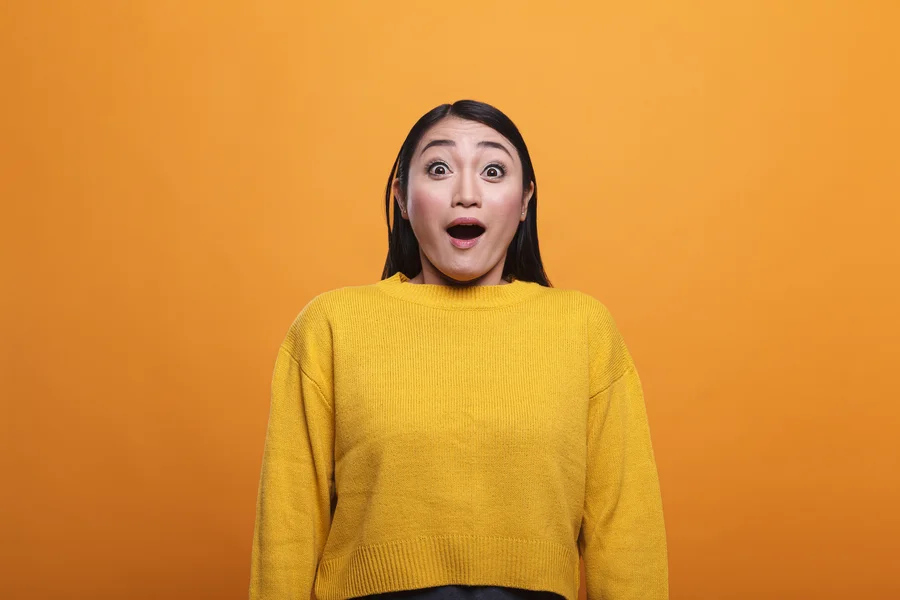 Homebuyer reviewing debt payoff strategy with tax refund before mortgage application